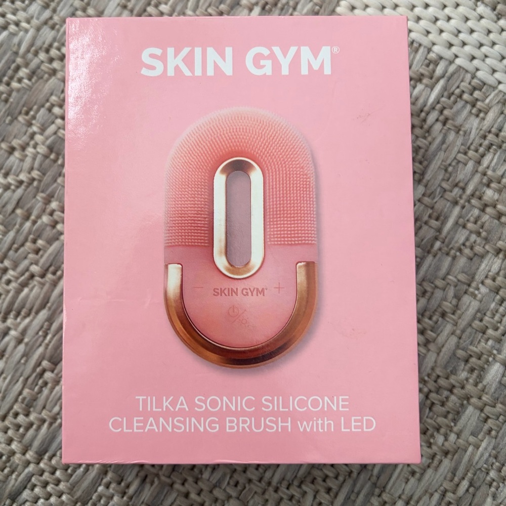 Skin Gym Tilka Sonic Silicone Cleansing Brush with LED. New in box. Never used.